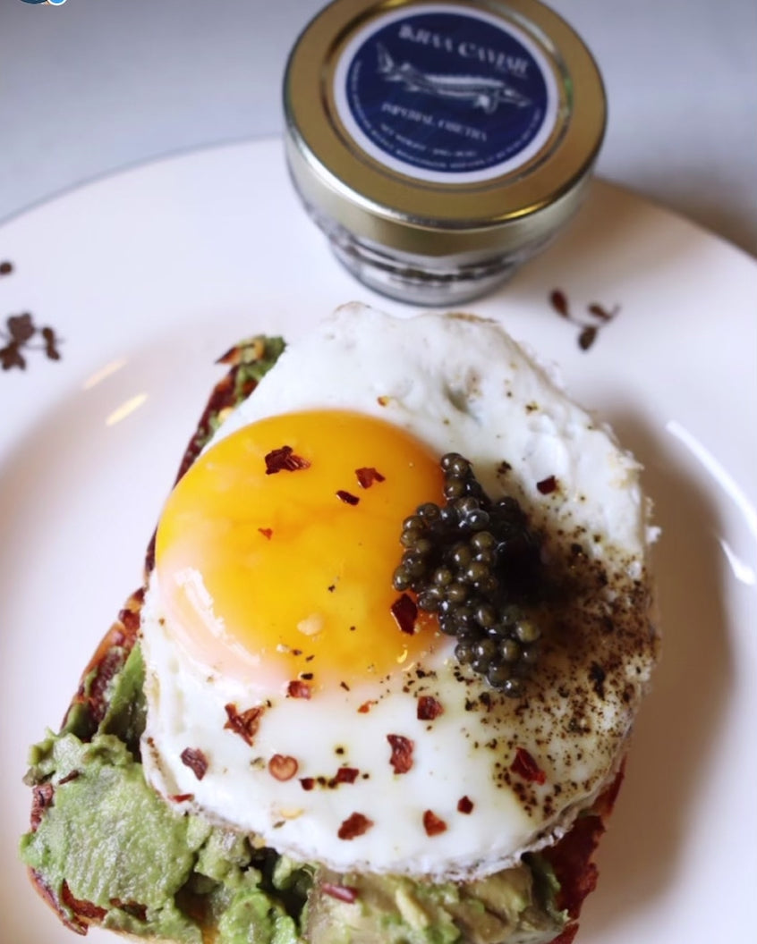 imperial osetra caviar and avocado toast with egg